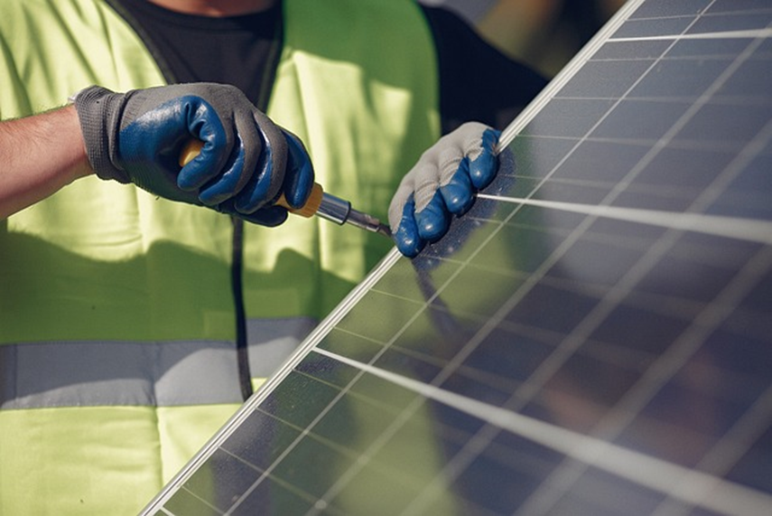 Men Repairing Solar Panels